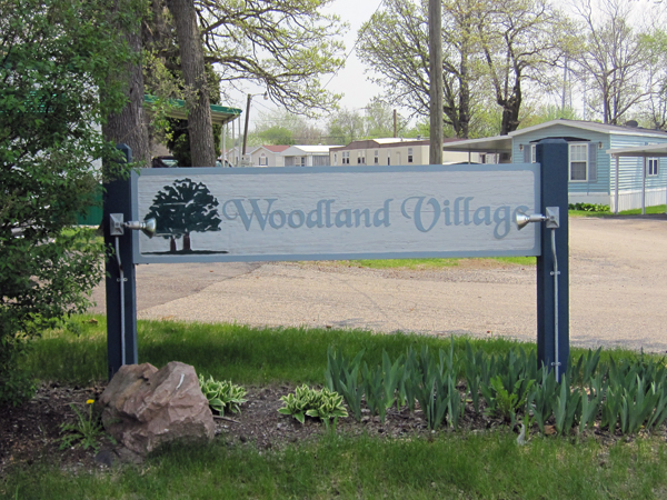 Woodland Village entrance sign